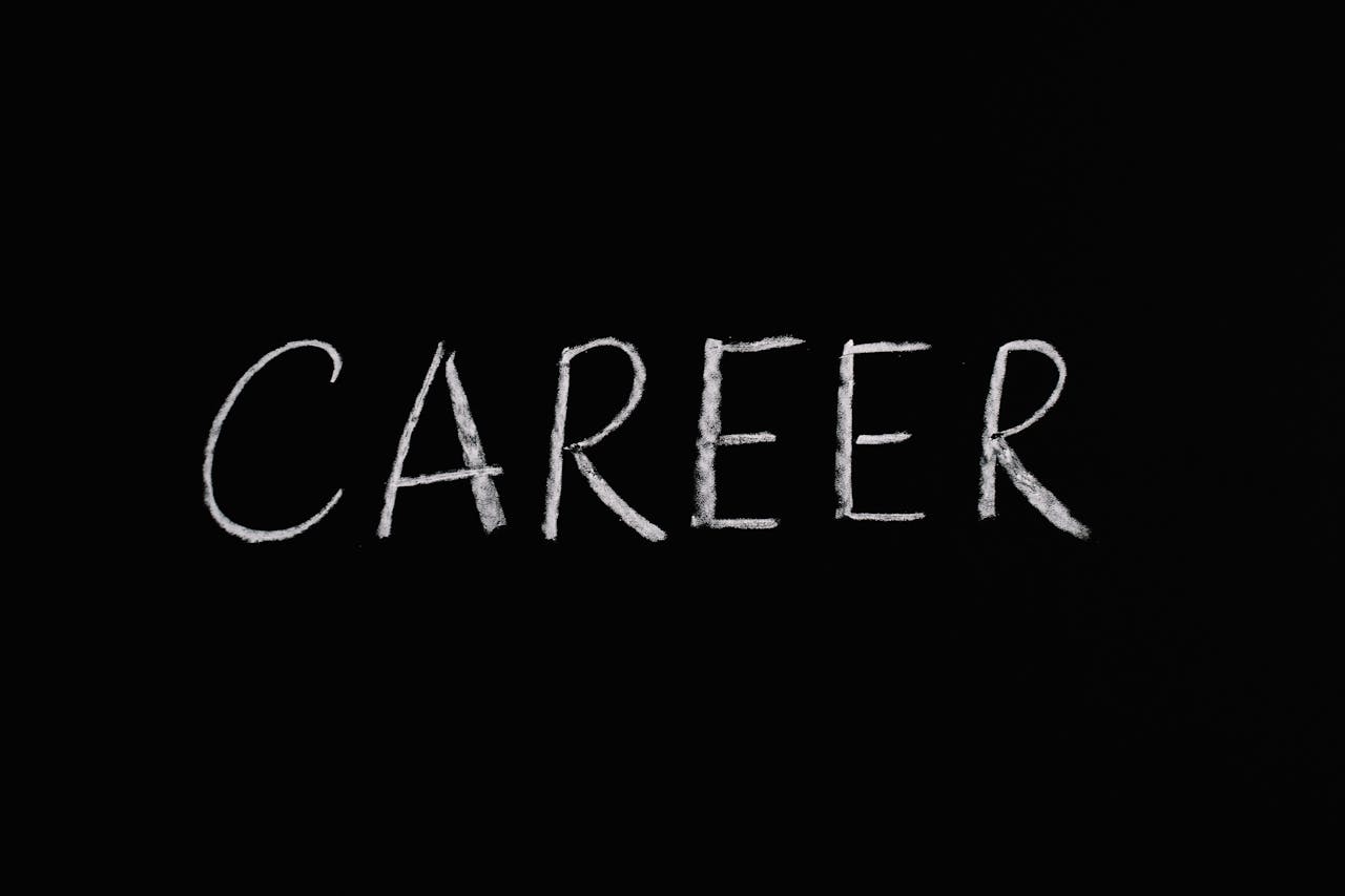 Chalk writing of 'Career' on a blackboard, symbolizing professions and jobs.